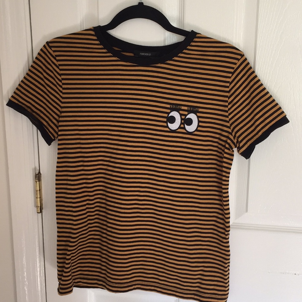 striped t-shirt with eyeball patch